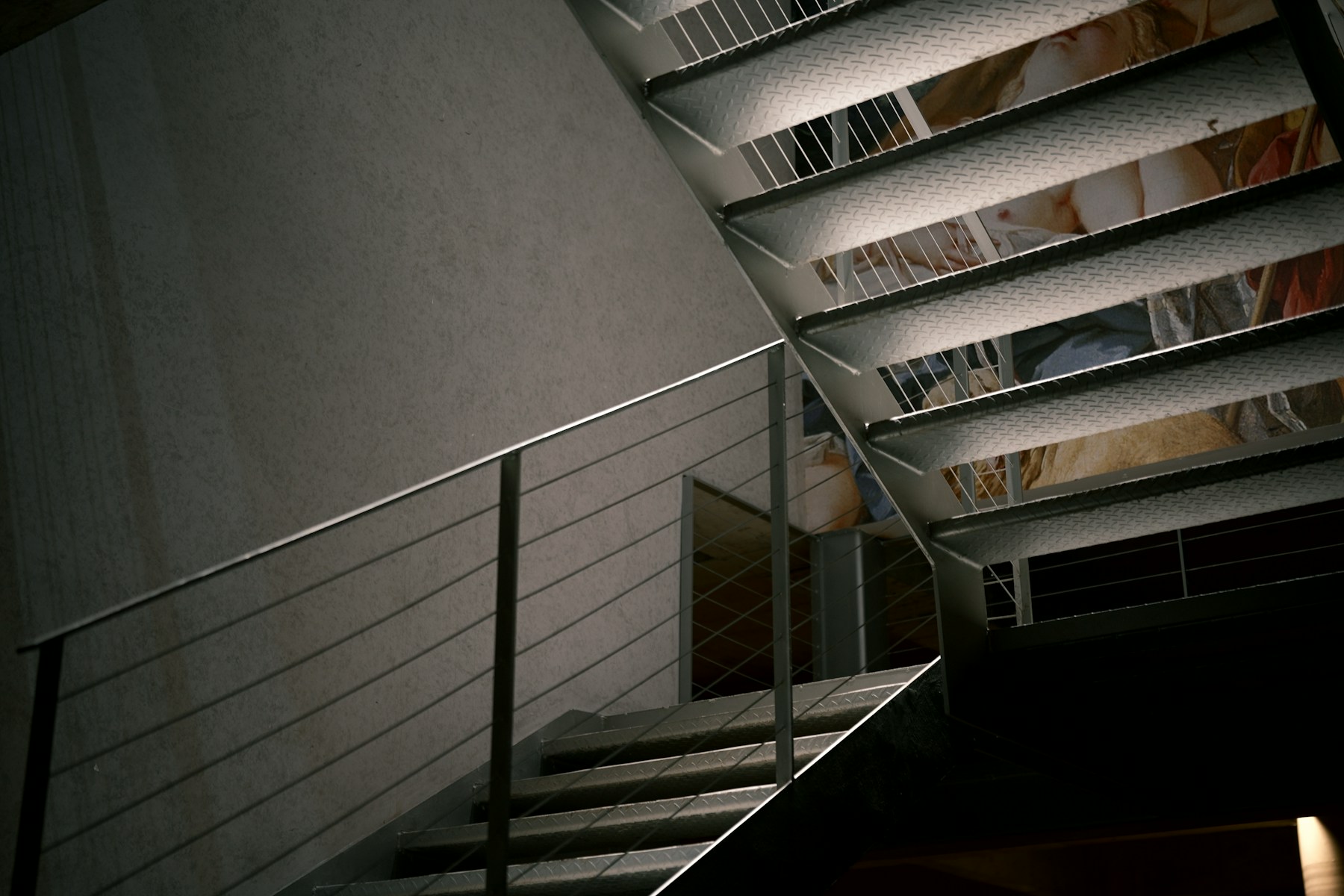 Modern steel staircase with architectural metal railing